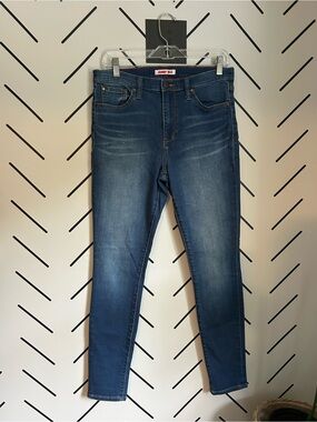 Johnny was medium wash high rise stretch skinny jeans